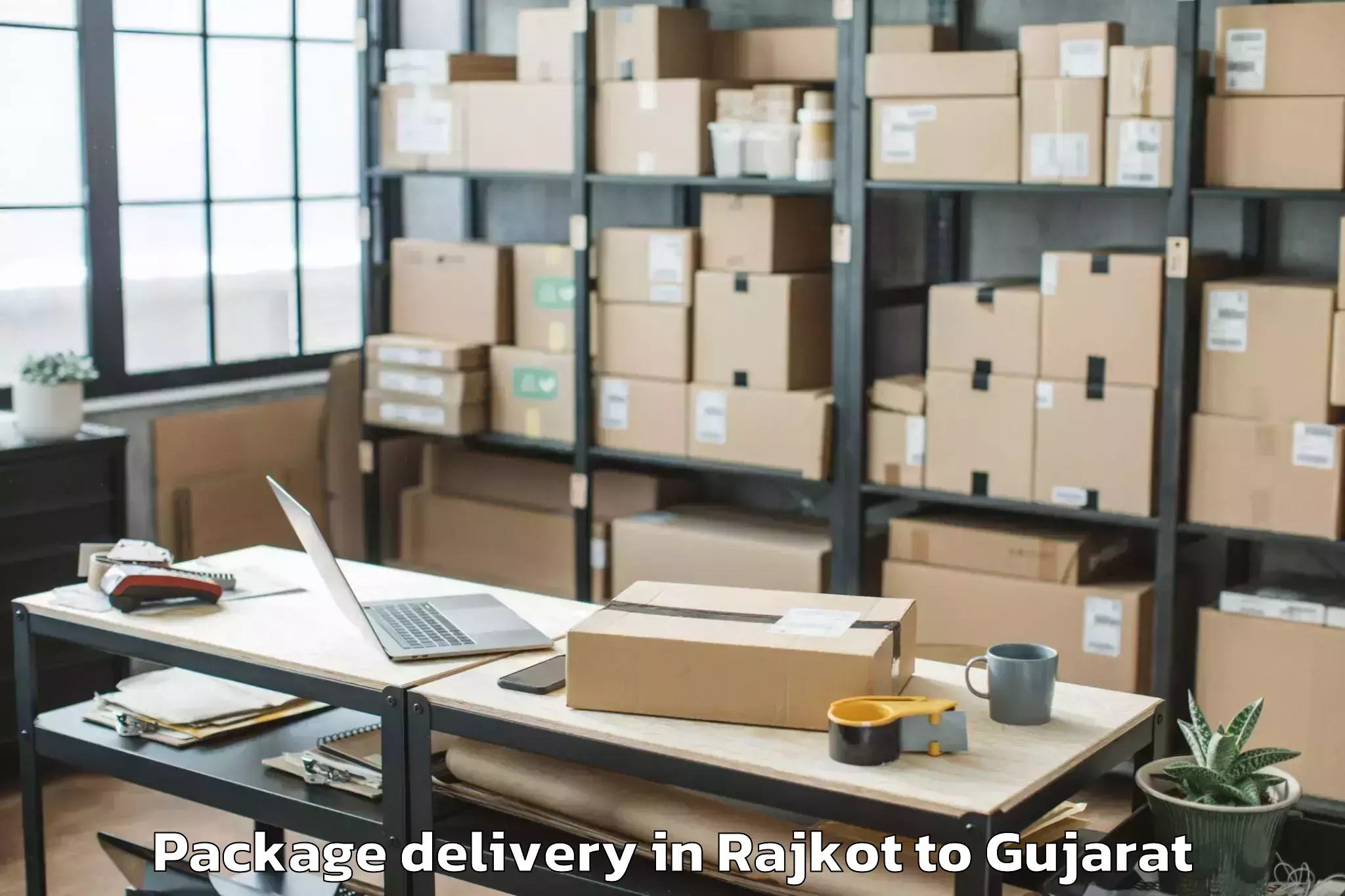 Book Your Rajkot to Kheralu Package Delivery Today